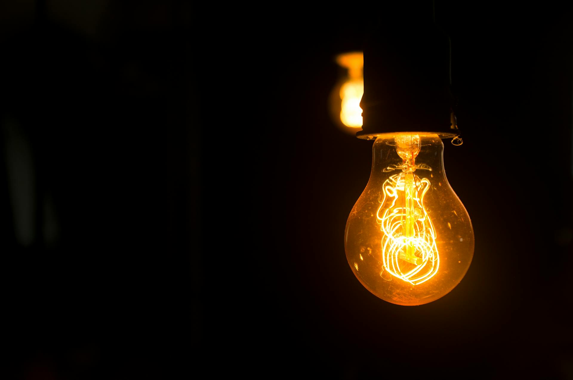 An image of a lightbulb turning on, representing the realization and self-understanding of autistic traits.