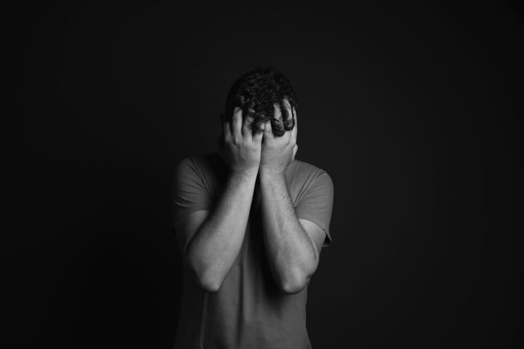 Photograph depicting the feeling of autistic burnout and emotional overwhelm from multiple life demands.
