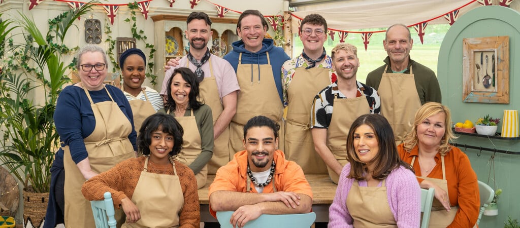 A photo of contestants from the Great British Bake Off.