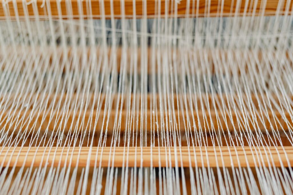 Woven threads representing the intersection of autism, trauma, and a gay identity.