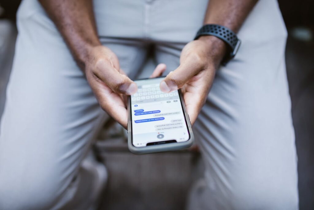 Anxious thoughts swirling around an unread phone message, symbolising social anxiety.