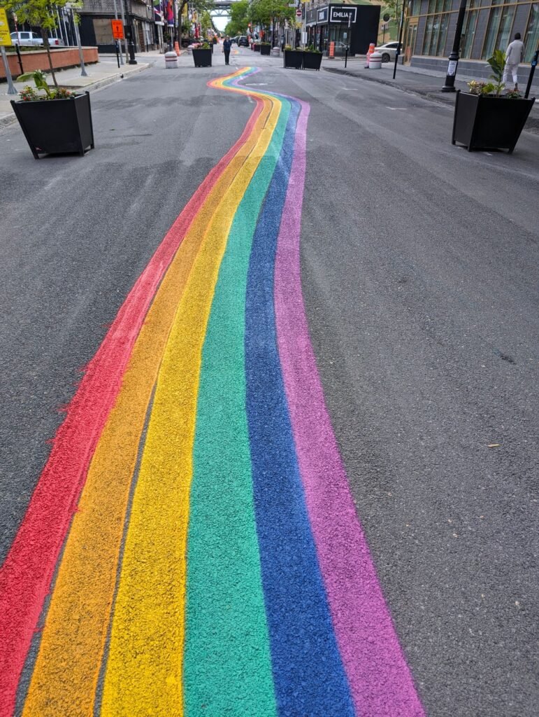 A quiet Pride parade route, evoking questions about whether LGBTQ+ acceptance is going backwards.